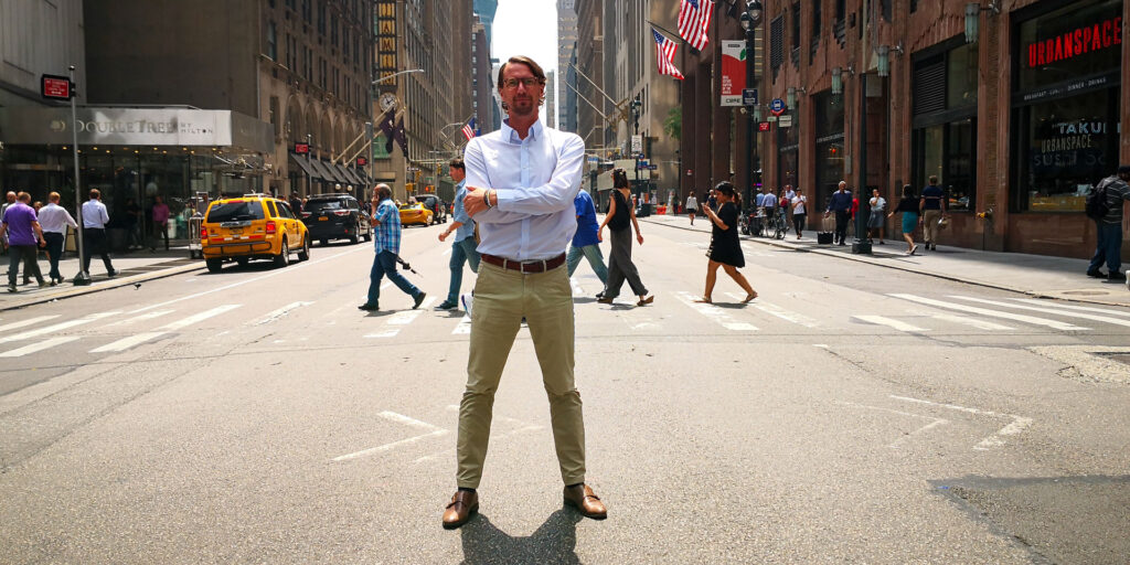 Victor Lagersten from Adapt standing on a street in Manhattan, New York. 