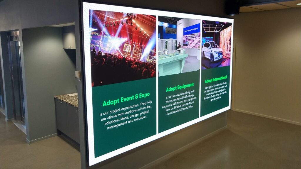 Indoor LED screens with information about Adapt