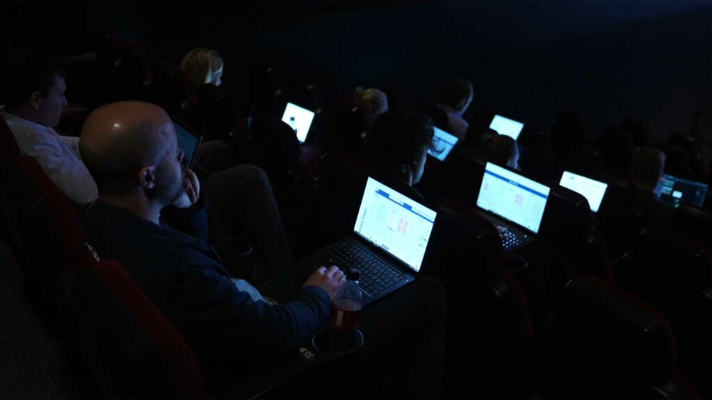 Participants' computers in a hybrid meeting