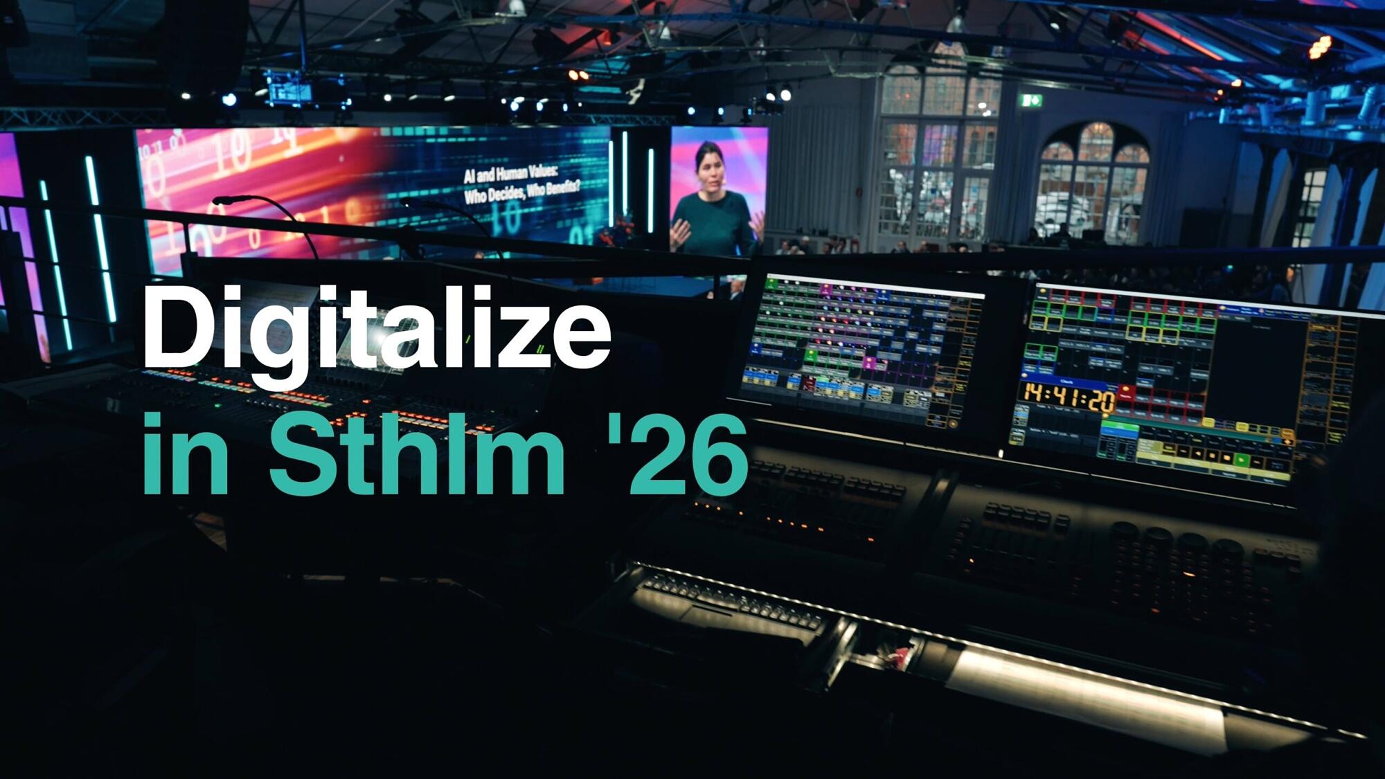 A control room with multiple screens overlooks a stage where a woman is presenting. Text on the image reads Digitalize in Sthlm 26 in large white and teal letters.