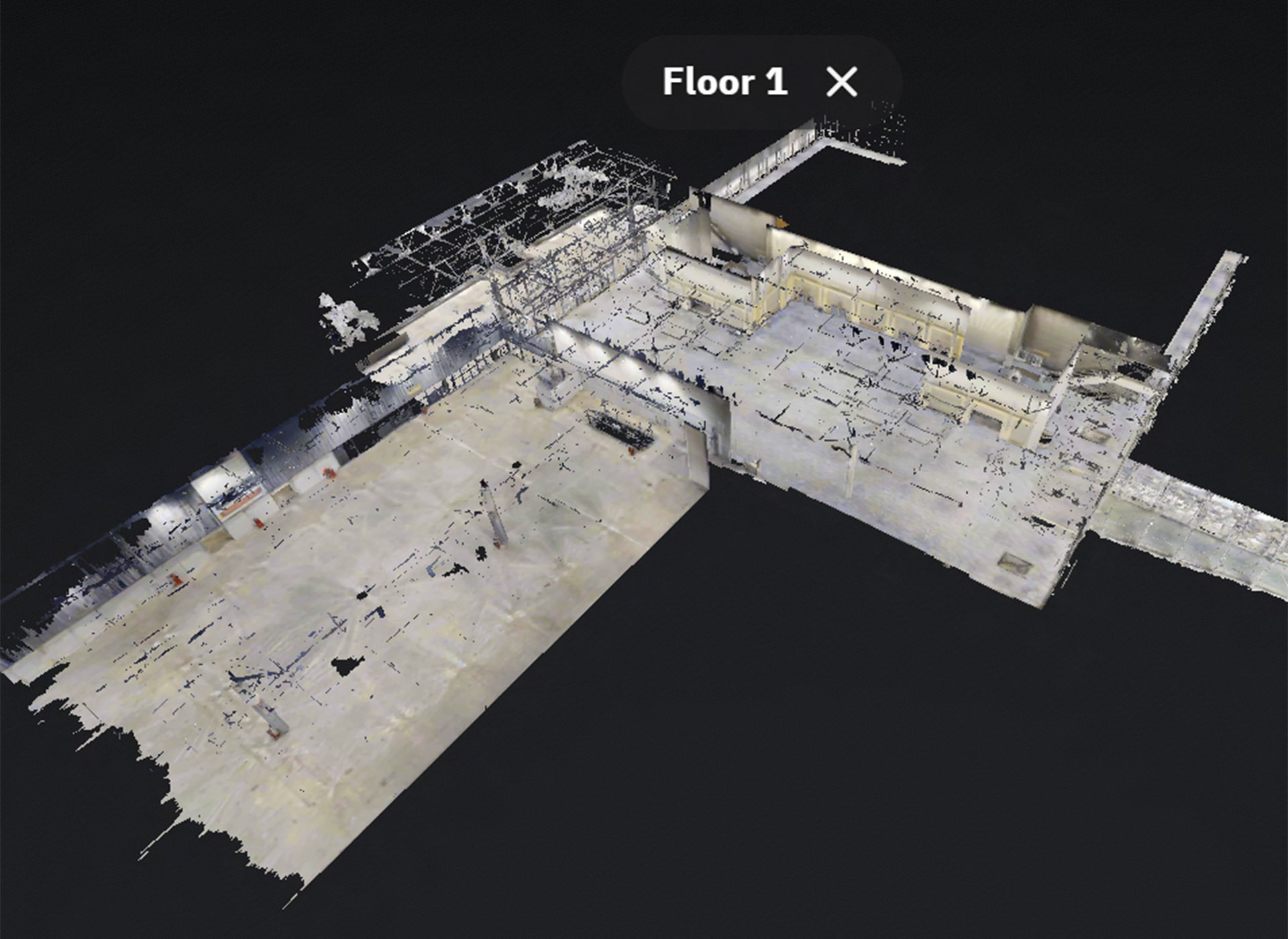 3D digital model of a building’s first floor, showing room layouts and walls, with some areas partially rendered or missing details against a black background. A label at the top reads Floor 1.